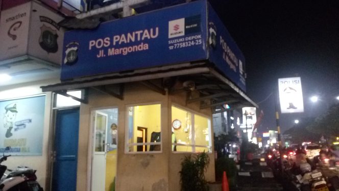 
					Pos Polantas Margonda Diserang Suporter Bola. (FOTO : Harian Sederhana)